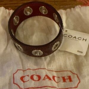 NEW Coach Burgundy Patent Grommet Bracelet w/dust bag
